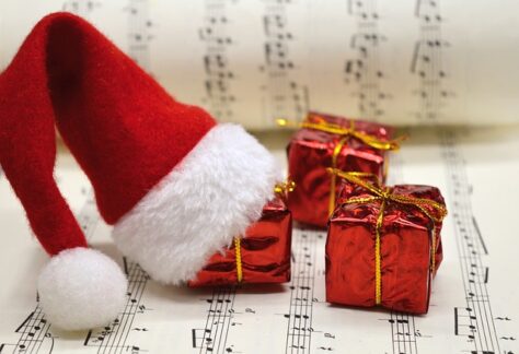 Otley Spiritualist Church - Christmas Carol Service - Santa Hat on Music